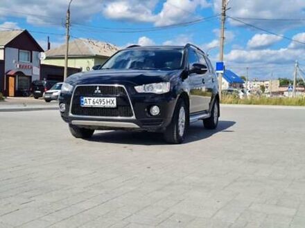 Черный Мицубиси Аутлендер, объемом двигателя 2.27 л и пробегом 195 тыс. км за 10500 $, фото 1 на Automoto.ua