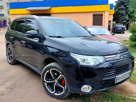 Черный Мицубиси Аутлендер, объемом двигателя 2.3 л и пробегом 140 тыс. км за 1750 $, фото 1 на Automoto.ua