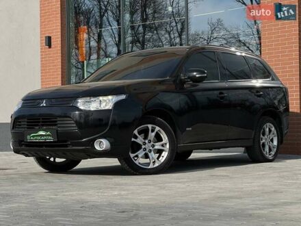 Мицубиси Аутлендер 2012 в Киеве на Automoto.ua Черный Мицубиси Аутлендер, объемом двигателя 2.36 л и пробегом 212 тыс. км за 11490 $, фото 1 на Automoto.ua