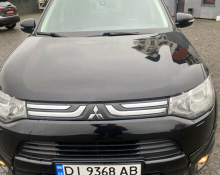 Черный Мицубиси Аутлендер, объемом двигателя 2.27 л и пробегом 280 тыс. км за 11808 $, фото 1 на Automoto.ua