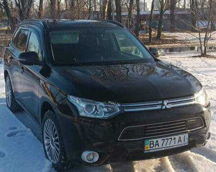 Черный Мицубиси Аутлендер, объемом двигателя 2 л и пробегом 303 тыс. км за 14900 $, фото 1 на Automoto.ua