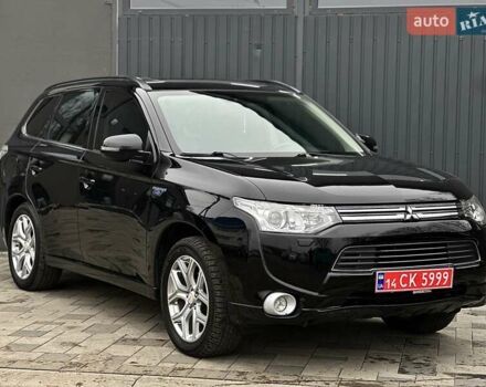 Чорний Міцубісі Аутлендер, об'ємом двигуна 2 л та пробігом 213 тис. км за 13888 $, фото 1 на Automoto.ua