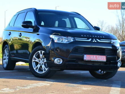 Черный Мицубиси Аутлендер, объемом двигателя 2.2 л и пробегом 237 тыс. км за 12550 $, фото 1 на Automoto.ua