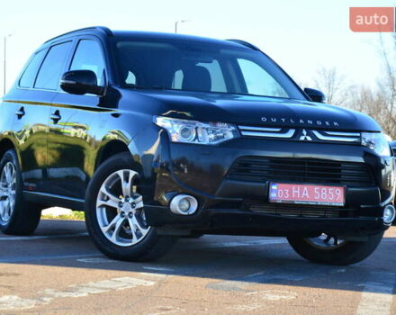 Черный Мицубиси Аутлендер, объемом двигателя 2.2 л и пробегом 237 тыс. км за 12550 $, фото 1 на Automoto.ua
