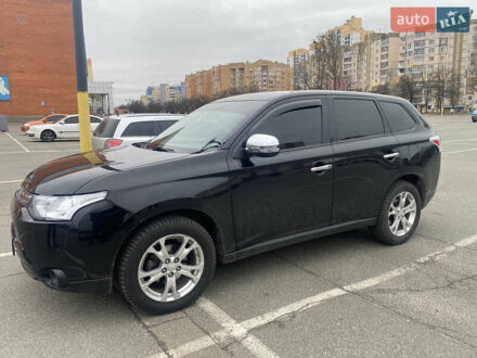 Черный Мицубиси Аутлендер, объемом двигателя 2.4 л и пробегом 150 тыс. км за 13700 $, фото 1 на Automoto.ua