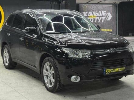 Мицубиси Аутлендер 2013 в Черновцах на Automoto.ua Черный Мицубиси Аутлендер, объемом двигателя 2.4 л и пробегом 150 тыс. км за 14200 $, фото 1 на Automoto.ua