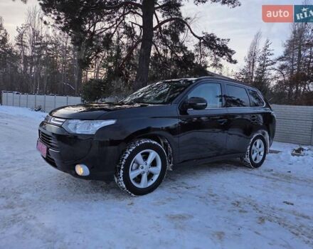Черный Мицубиси Аутлендер, объемом двигателя 2 л и пробегом 158 тыс. км за 13850 $, фото 1 на Automoto.ua