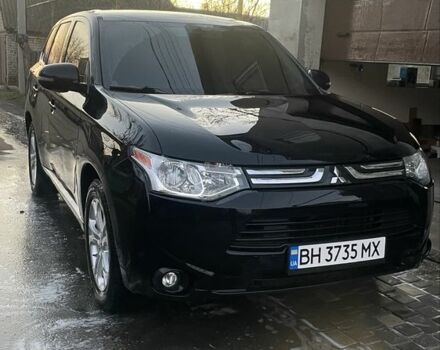 Черный Мицубиси Аутлендер, объемом двигателя 2.4 л и пробегом 160 тыс. км за 12200 $, фото 1 на Automoto.ua