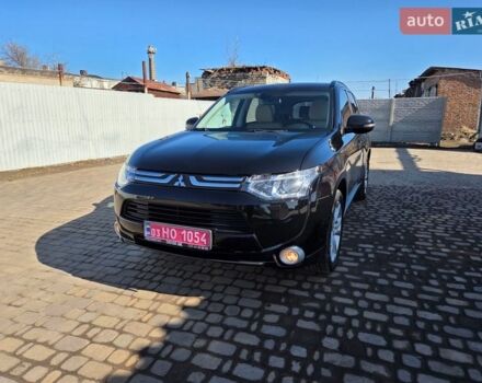 Черный Мицубиси Аутлендер, объемом двигателя 2 л и пробегом 158 тыс. км за 13700 $, фото 1 на Automoto.ua