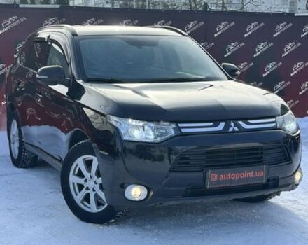 Черный Мицубиси Аутлендер, объемом двигателя 2.27 л и пробегом 323 тыс. км за 13650 $, фото 1 на Automoto.ua