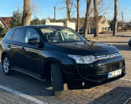 Черный Мицубиси Аутлендер, объемом двигателя 3 л и пробегом 190 тыс. км за 9600 $, фото 1 на Automoto.ua