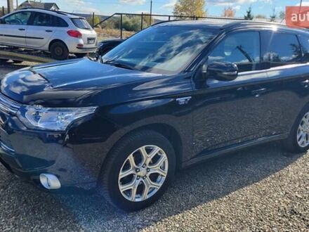 Черный Мицубиси Аутлендер, объемом двигателя 2 л и пробегом 237 тыс. км за 13800 $, фото 1 на Automoto.ua