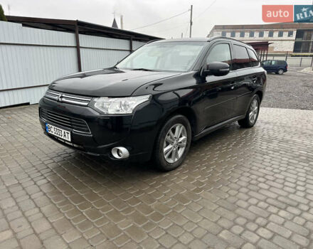 Чорний Міцубісі Аутлендер, об'ємом двигуна 2 л та пробігом 223 тис. км за 13400 $, фото 1 на Automoto.ua