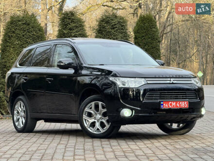 Черный Мицубиси Аутлендер, объемом двигателя 2 л и пробегом 173 тыс. км за 15299 $, фото 1 на Automoto.ua