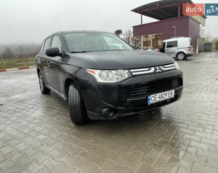 Чорний Міцубісі Аутлендер, об'ємом двигуна 2.4 л та пробігом 150 тис. км за 12200 $, фото 1 на Automoto.ua