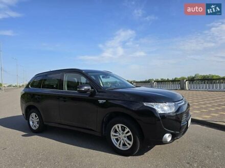 Мицубиси Аутлендер 2014 в Киеве на Automoto.ua Черный Мицубиси Аутлендер, объемом двигателя 2 л и пробегом 230 тыс. км за 14399 $, фото 1 на Automoto.ua