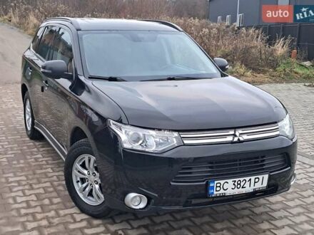 Чорний Міцубісі Аутлендер, об'ємом двигуна 2 л та пробігом 170 тис. км за 12990 $, фото 1 на Automoto.ua