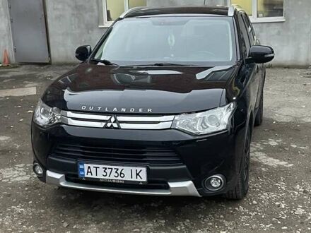 Черный Мицубиси Аутлендер, объемом двигателя 2.27 л и пробегом 154 тыс. км за 18000 $, фото 1 на Automoto.ua