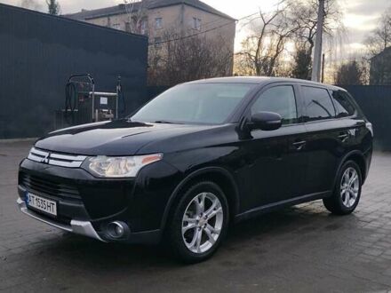 Черный Мицубиси Аутлендер, объемом двигателя 2.4 л и пробегом 224 тыс. км за 12000 $, фото 1 на Automoto.ua
