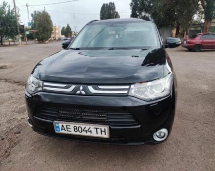Черный Мицубиси Аутлендер, объемом двигателя 2.4 л и пробегом 220 тыс. км за 13400 $, фото 1 на Automoto.ua