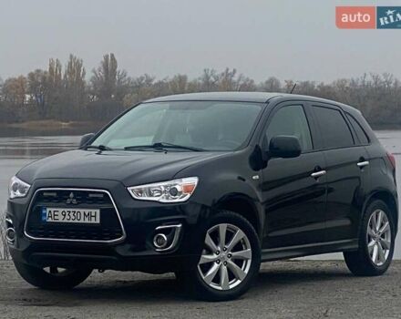 Черный Мицубиси Аутлендер, объемом двигателя 2 л и пробегом 250 тыс. км за 10800 $, фото 1 на Automoto.ua