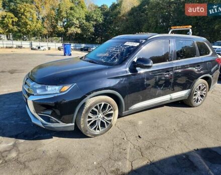 Чорний Міцубісі Аутлендер, об'ємом двигуна 2.36 л та пробігом 99 тис. км за 2100 $, фото 1 на Automoto.ua