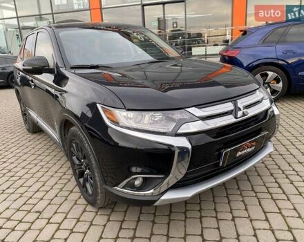 Черный Мицубиси Аутлендер, объемом двигателя 2.36 л и пробегом 143 тыс. км за 12900 $, фото 1 на Automoto.ua