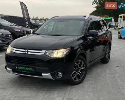 Черный Мицубиси Аутлендер, объемом двигателя 3 л и пробегом 146 тыс. км за 16690 $, фото 1 на Automoto.ua