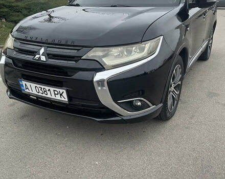 Черный Мицубиси Аутлендер, объемом двигателя 3 л и пробегом 260 тыс. км за 13799 $, фото 1 на Automoto.ua