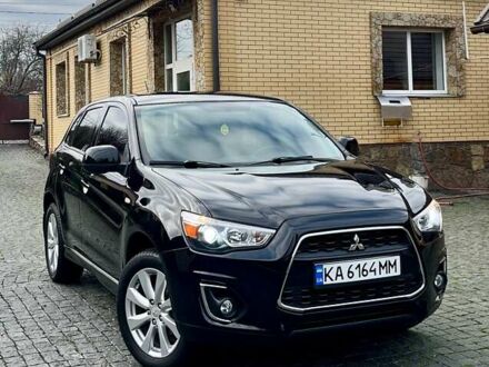 Чорний Міцубісі Аутлендер, об'ємом двигуна 2 л та пробігом 170 тис. км за 10999 $, фото 1 на Automoto.ua