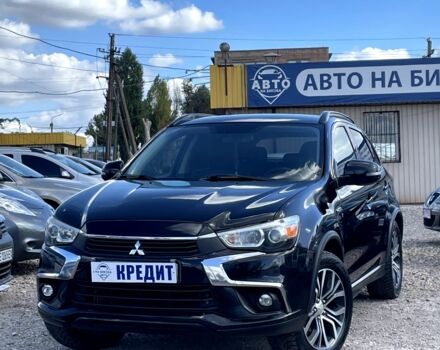 Черный Мицубиси Аутлендер, объемом двигателя 2.5 л и пробегом 225 тыс. км за 13950 $, фото 1 на Automoto.ua