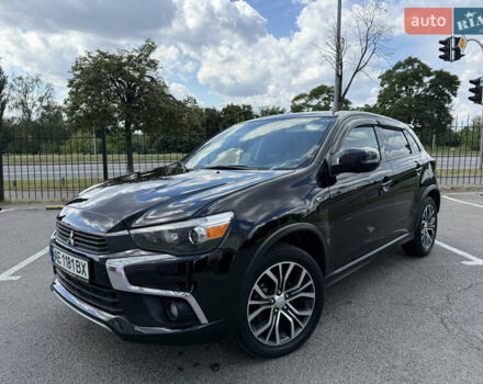 Черный Мицубиси Аутлендер, объемом двигателя 2 л и пробегом 90 тыс. км за 12300 $, фото 1 на Automoto.ua