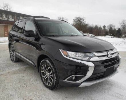 Чорний Міцубісі Аутлендер, об'ємом двигуна 2.4 л та пробігом 70 тис. км за 6500 $, фото 1 на Automoto.ua