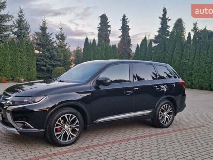 Чорний Міцубісі Аутлендер, об'ємом двигуна 2.36 л та пробігом 168 тис. км за 14999 $, фото 1 на Automoto.ua