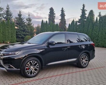 Чорний Міцубісі Аутлендер, об'ємом двигуна 2.36 л та пробігом 168 тис. км за 14999 $, фото 1 на Automoto.ua