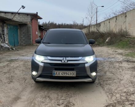 Черный Мицубиси Аутлендер, объемом двигателя 2.4 л и пробегом 185 тыс. км за 14300 $, фото 1 на Automoto.ua