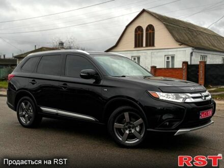 Чорний Міцубісі Аутлендер, об'ємом двигуна 3 л та пробігом 99 тис. км за 15998 $, фото 1 на Automoto.ua