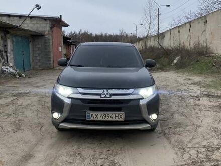 Черный Мицубиси Аутлендер, объемом двигателя 2.4 л и пробегом 185 тыс. км за 14300 $, фото 1 на Automoto.ua