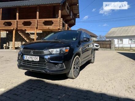 Чорний Міцубісі Аутлендер, об'ємом двигуна 2.4 л та пробігом 100 тис. км за 15000 $, фото 1 на Automoto.ua