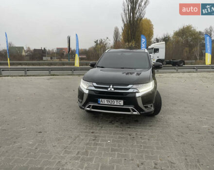 Чорний Міцубісі Аутлендер, об'ємом двигуна 2 л та пробігом 145 тис. км за 21200 $, фото 1 на Automoto.ua