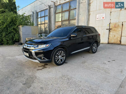 Черный Мицубиси Аутлендер, объемом двигателя 2.36 л и пробегом 108 тыс. км за 14600 $, фото 1 на Automoto.ua