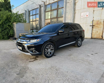 Черный Мицубиси Аутлендер, объемом двигателя 2.36 л и пробегом 108 тыс. км за 14600 $, фото 1 на Automoto.ua