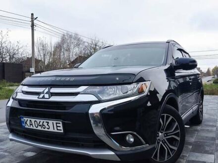 Черный Мицубиси Аутлендер, объемом двигателя 2.36 л и пробегом 213 тыс. км за 14500 $, фото 1 на Automoto.ua
