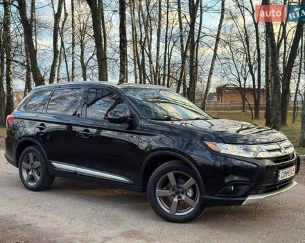Черный Мицубиси Аутлендер, объемом двигателя 3 л и пробегом 99 тыс. км за 15800 $, фото 1 на Automoto.ua