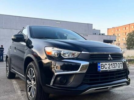 Чорний Міцубісі Аутлендер, об'ємом двигуна 2.36 л та пробігом 195 тис. км за 11100 $, фото 1 на Automoto.ua