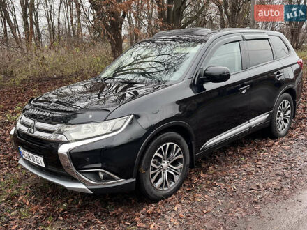 Чорний Міцубісі Аутлендер, об'ємом двигуна 2.36 л та пробігом 110 тис. км за 17500 $, фото 1 на Automoto.ua