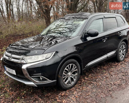 Чорний Міцубісі Аутлендер, об'ємом двигуна 2.36 л та пробігом 110 тис. км за 17500 $, фото 1 на Automoto.ua
