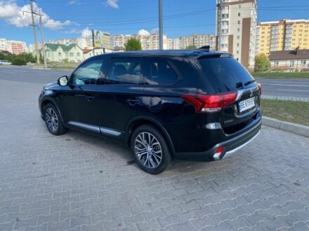 Чорний Міцубісі Аутлендер, об'ємом двигуна 2.4 л та пробігом 120 тис. км за 16000 $, фото 1 на Automoto.ua