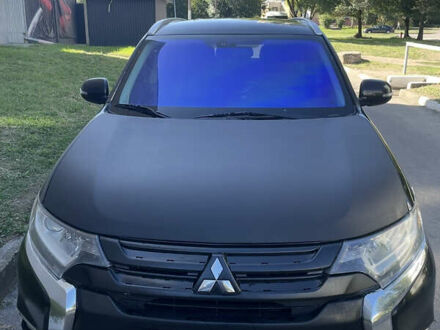 Чорний Міцубісі Аутлендер, об'ємом двигуна 2.36 л та пробігом 150 тис. км за 13500 $, фото 1 на Automoto.ua
