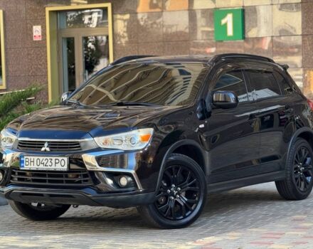 Черный Мицубиси Аутлендер, объемом двигателя 2.4 л и пробегом 130 тыс. км за 13900 $, фото 1 на Automoto.ua